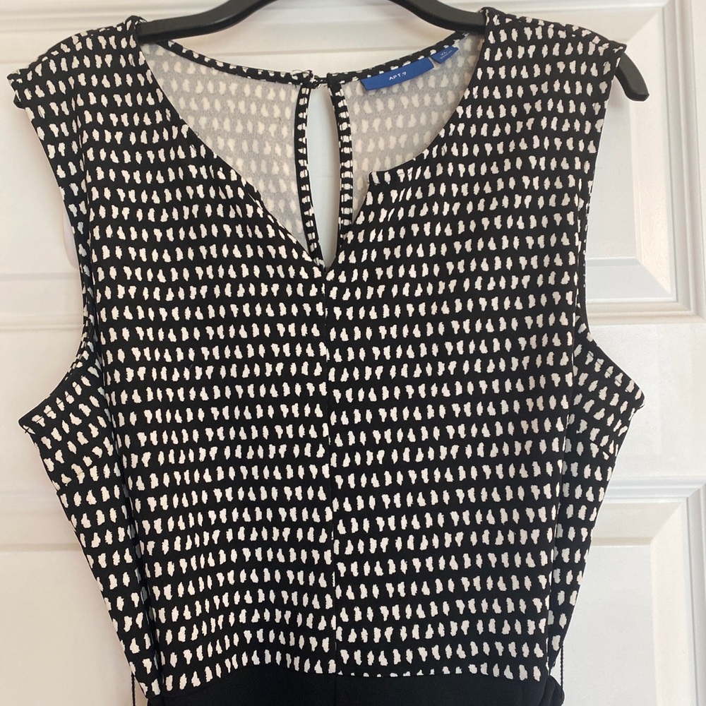 Cute jumper. Small pull in leg part as shown in picture. Smoke free home